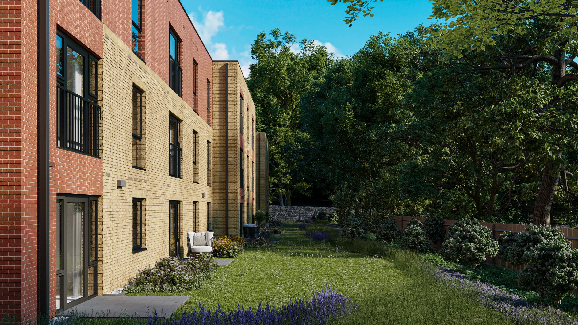 a brick building with a garden in front of it