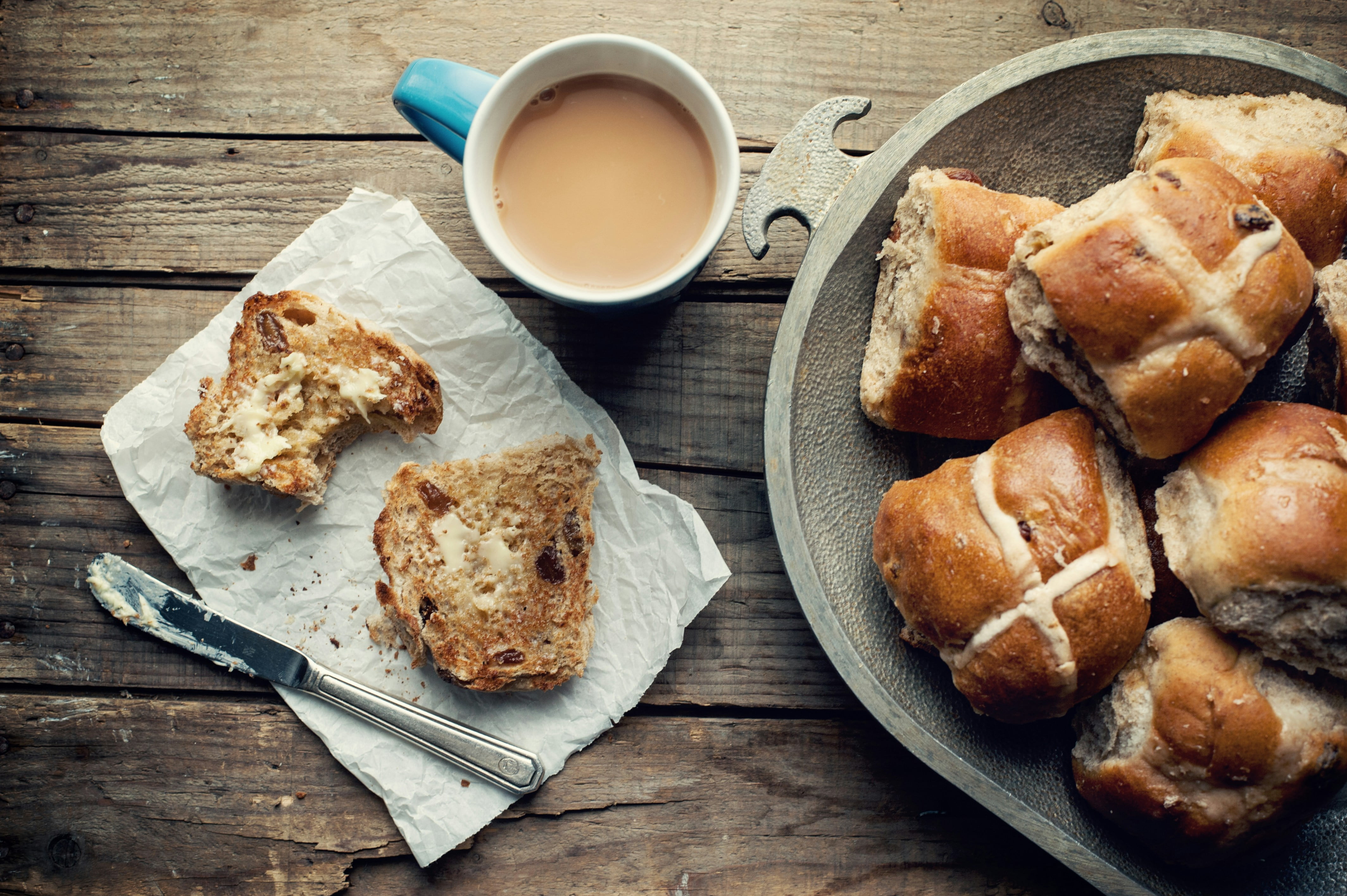 a plate of food and a cup of coffee