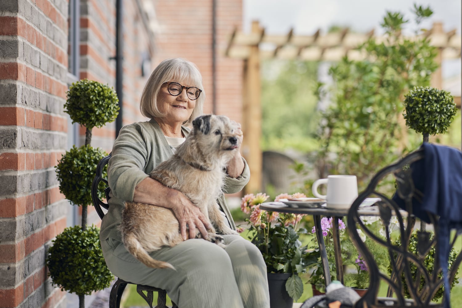 a person holding a dog