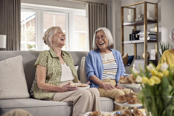a couple of women laughing