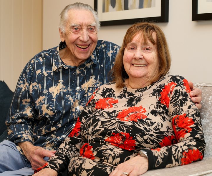 a man and woman sitting together