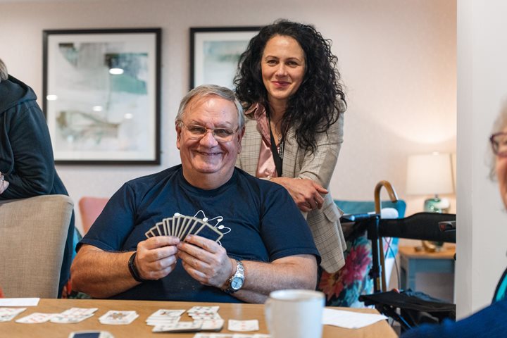a man and woman playing cards