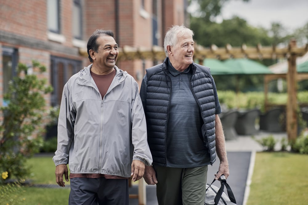 a couple of men walking
