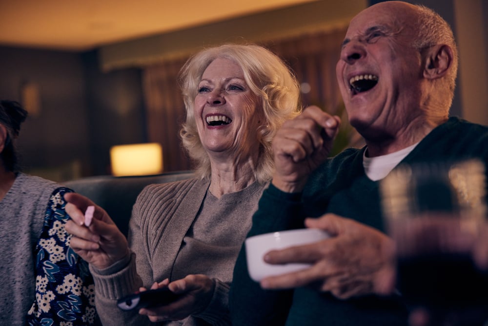 a man and a woman laughing