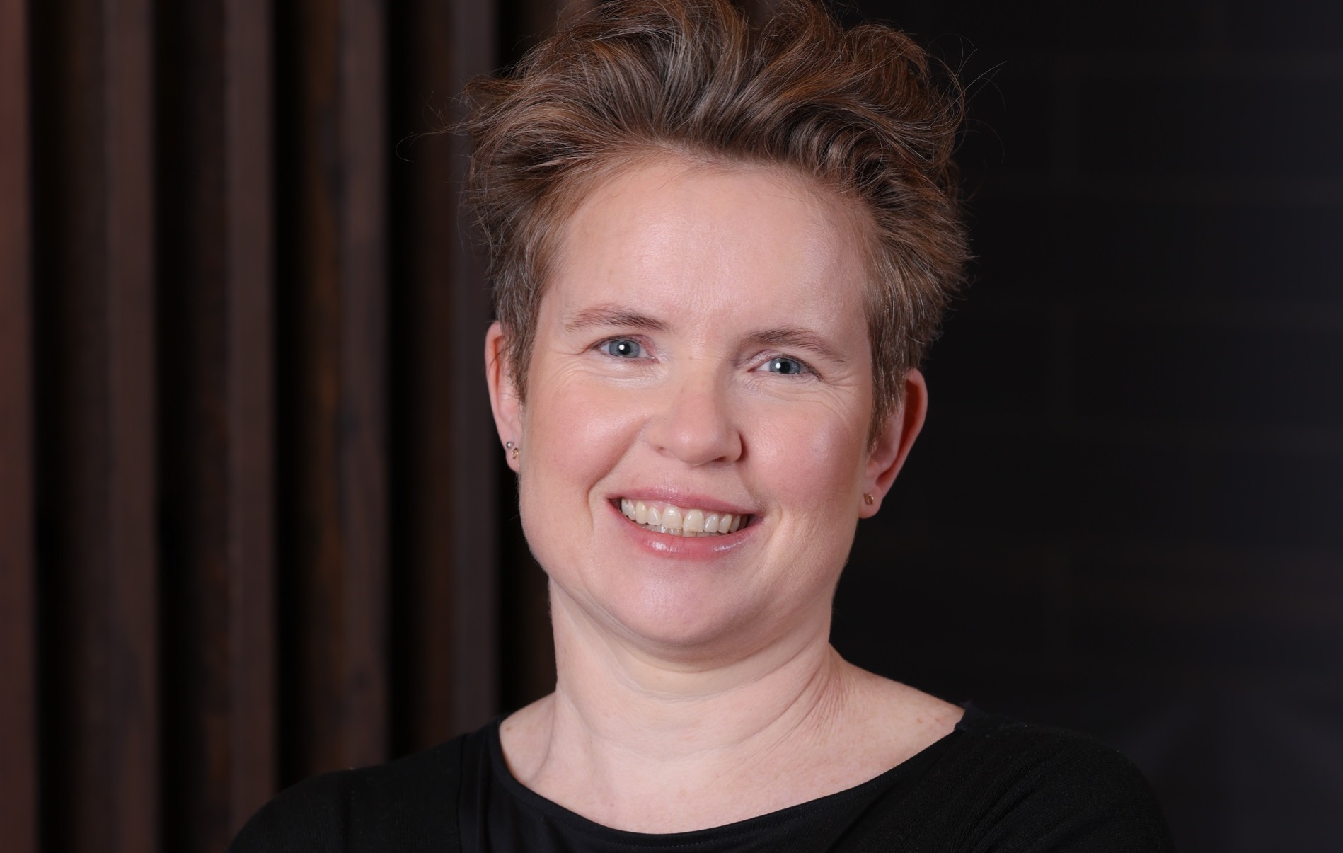 a person smiling for the camera