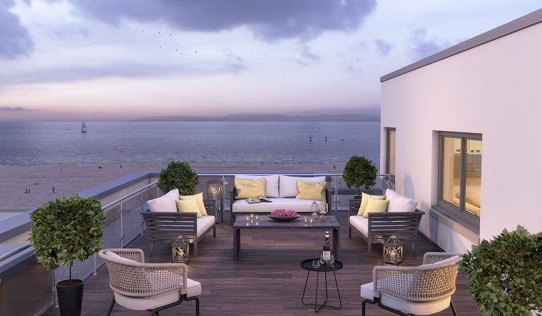 a patio with a table and chairs