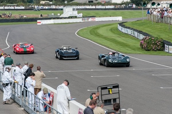 a group of people watching a race
