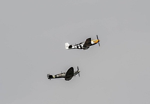 two planes flying in the sky