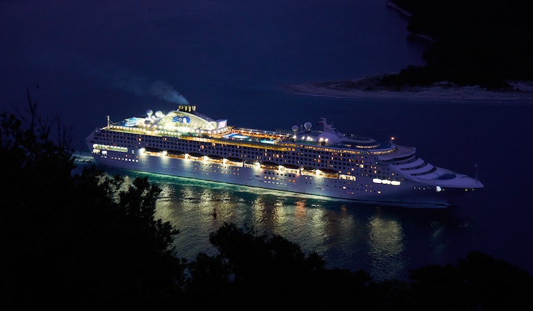 a large cruise ship at night