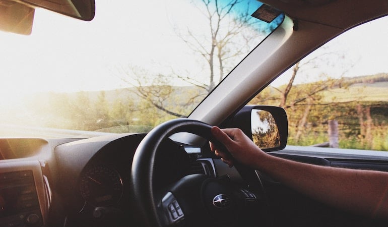 a person driving a car