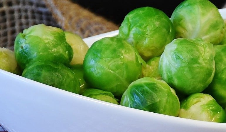 a bowl of green fruit