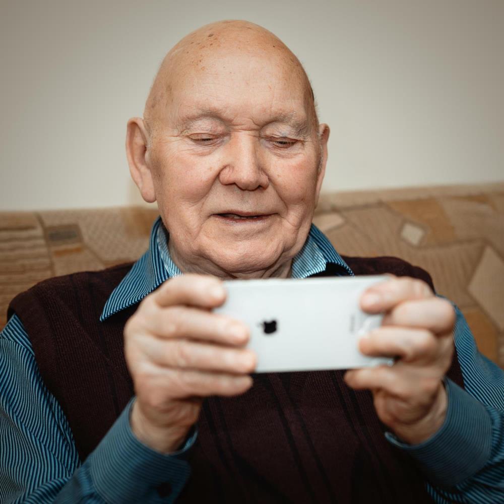 a man holding a cell phone
