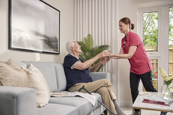 a woman giving a man a high five