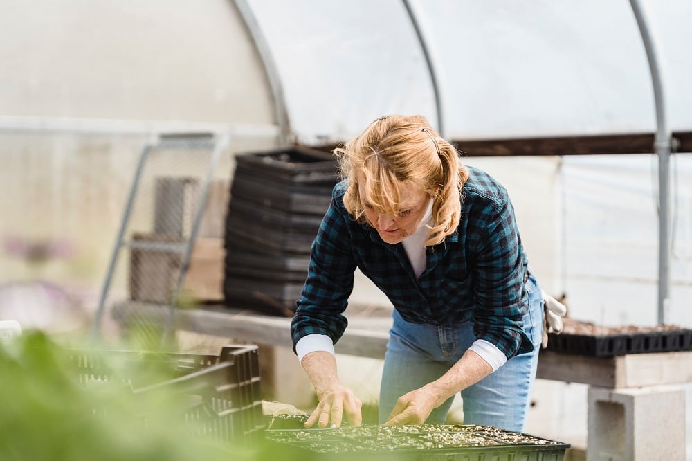 Woman in Greenhouse