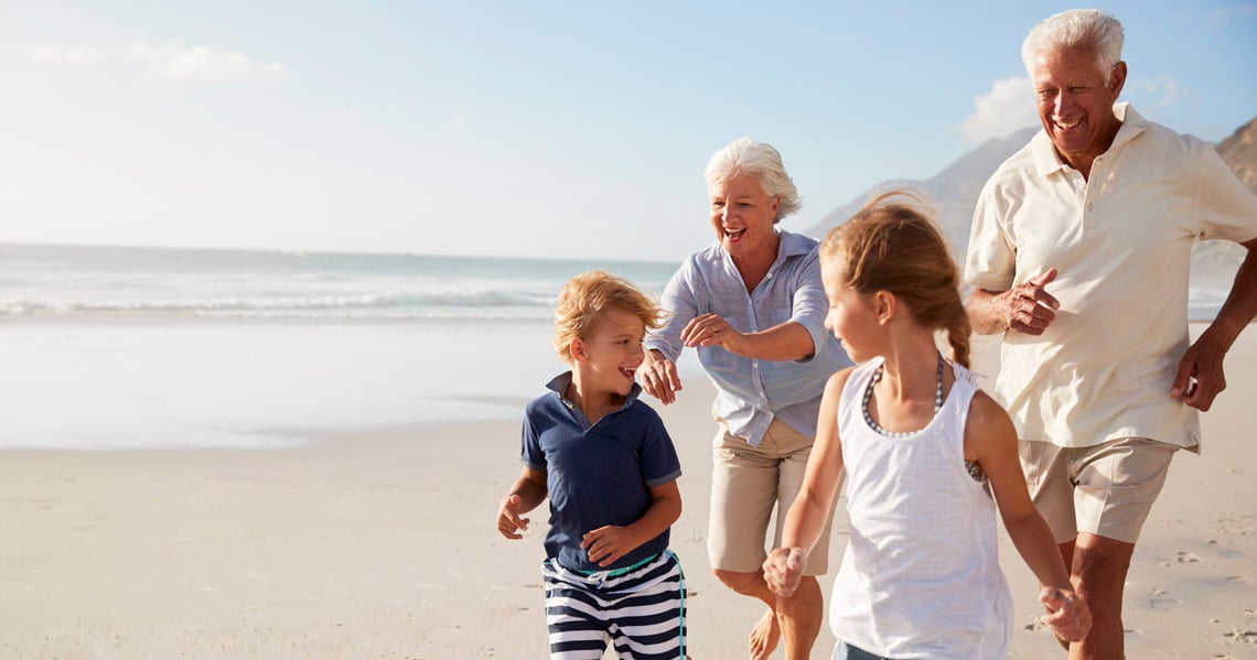 a family walking on a beach