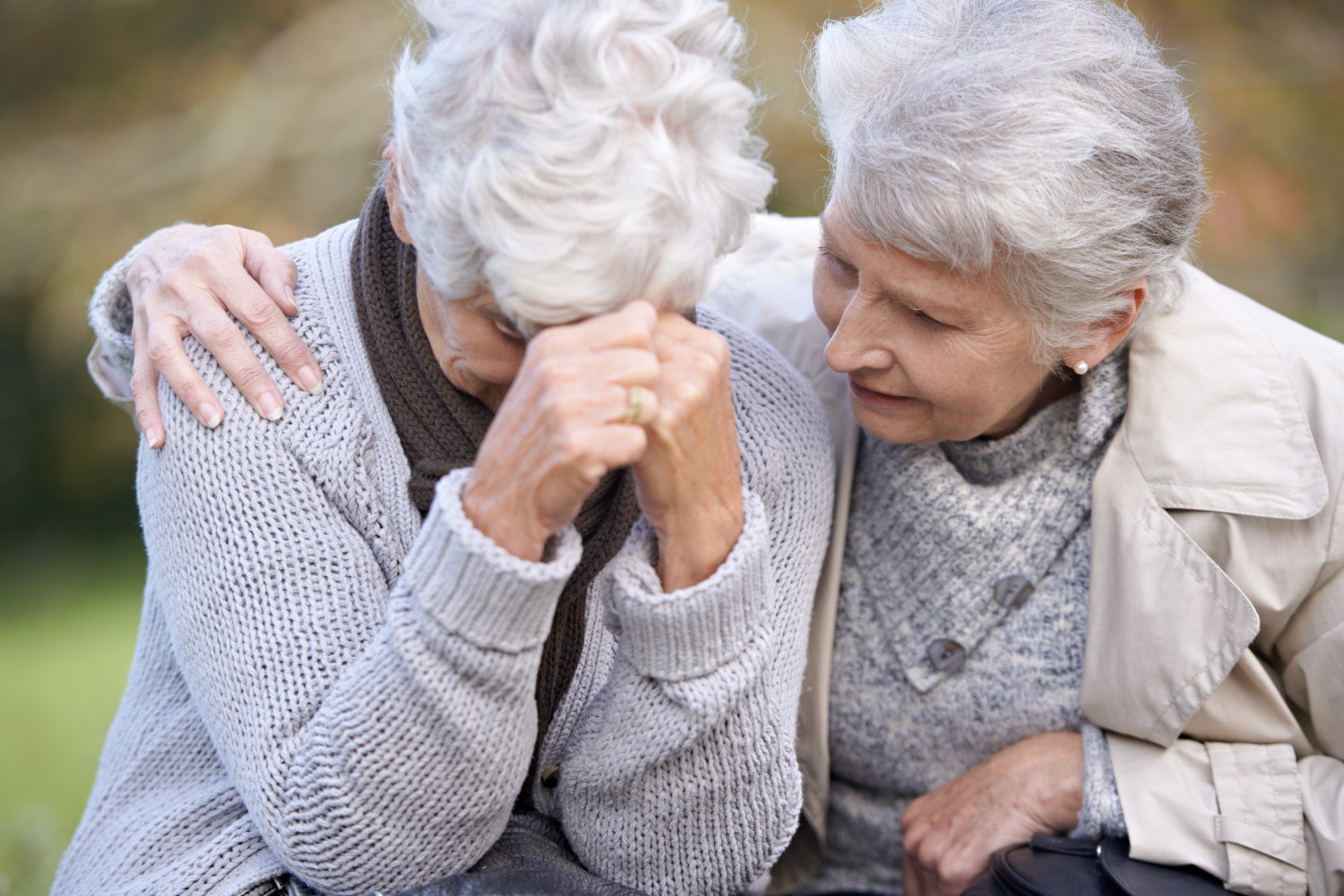 Grieving older woman coping after death of spouse