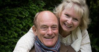 a man and woman smiling