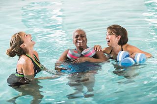 Women swimming water fitness