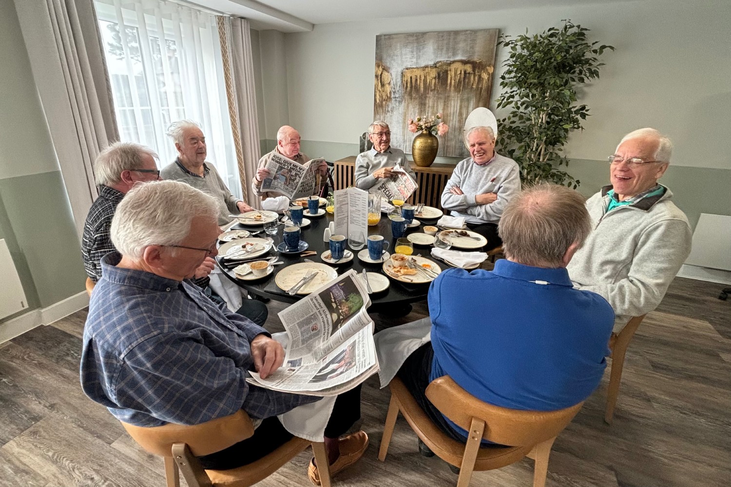 Men enjoying brunch, one of the retired men’s clubs at McCarthy Stone communities