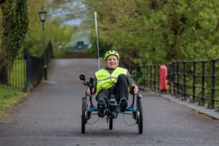 Retirement hobbies for men: Nigel rides his trike in the Kendal countryside near his McCarthy Stone retirement home