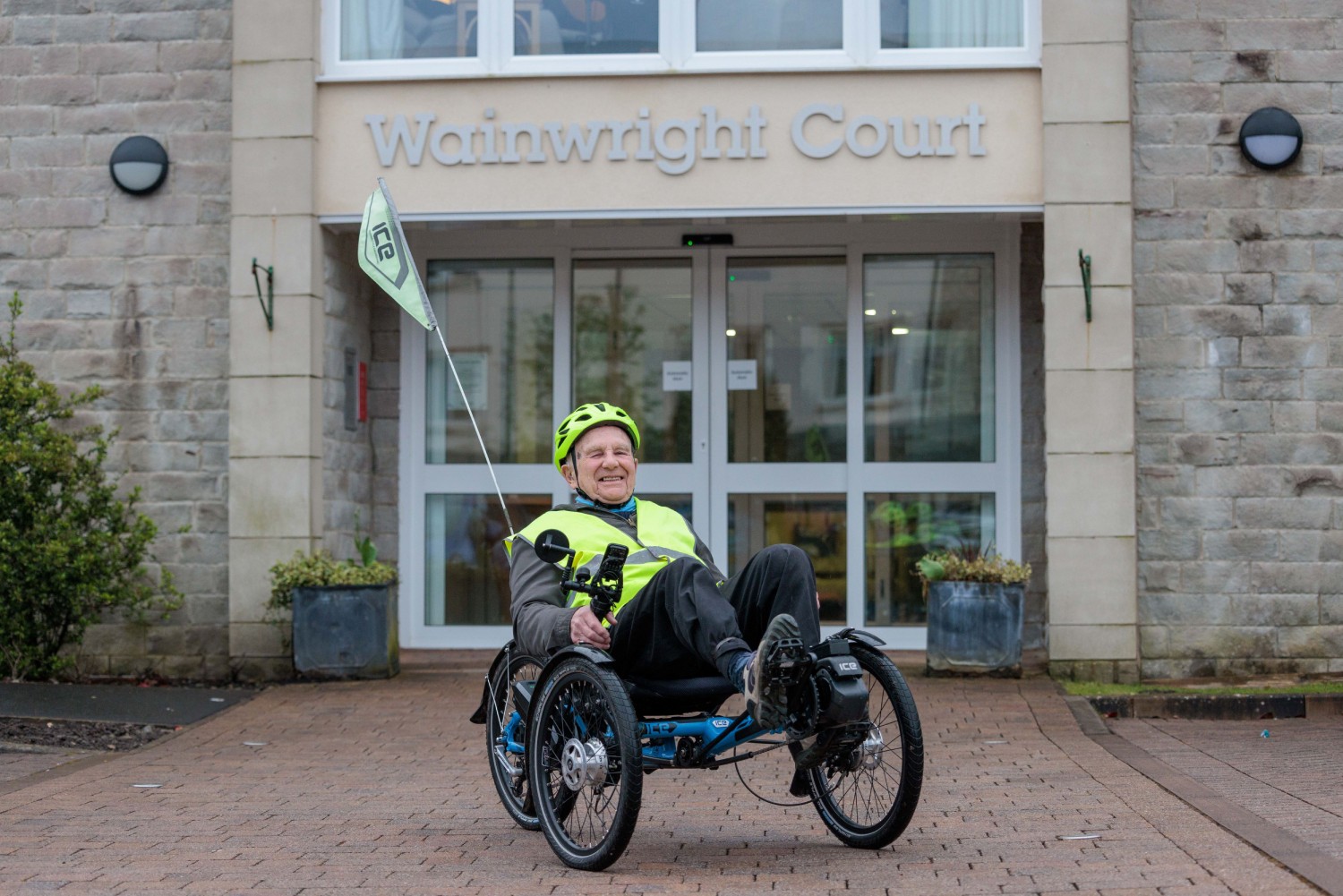 Retirement hobbies for men: Nigel on his trike outside his McCarthy Stone retirement home in Cumbria