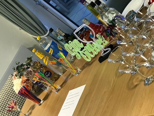 a table with glasses and bottles