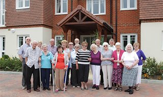 a group of people posing for a photo