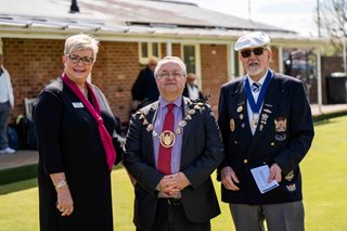 Blandford Forum bowling club accepts cheque from McCarthy Stone