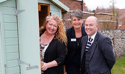 a group of people smiling