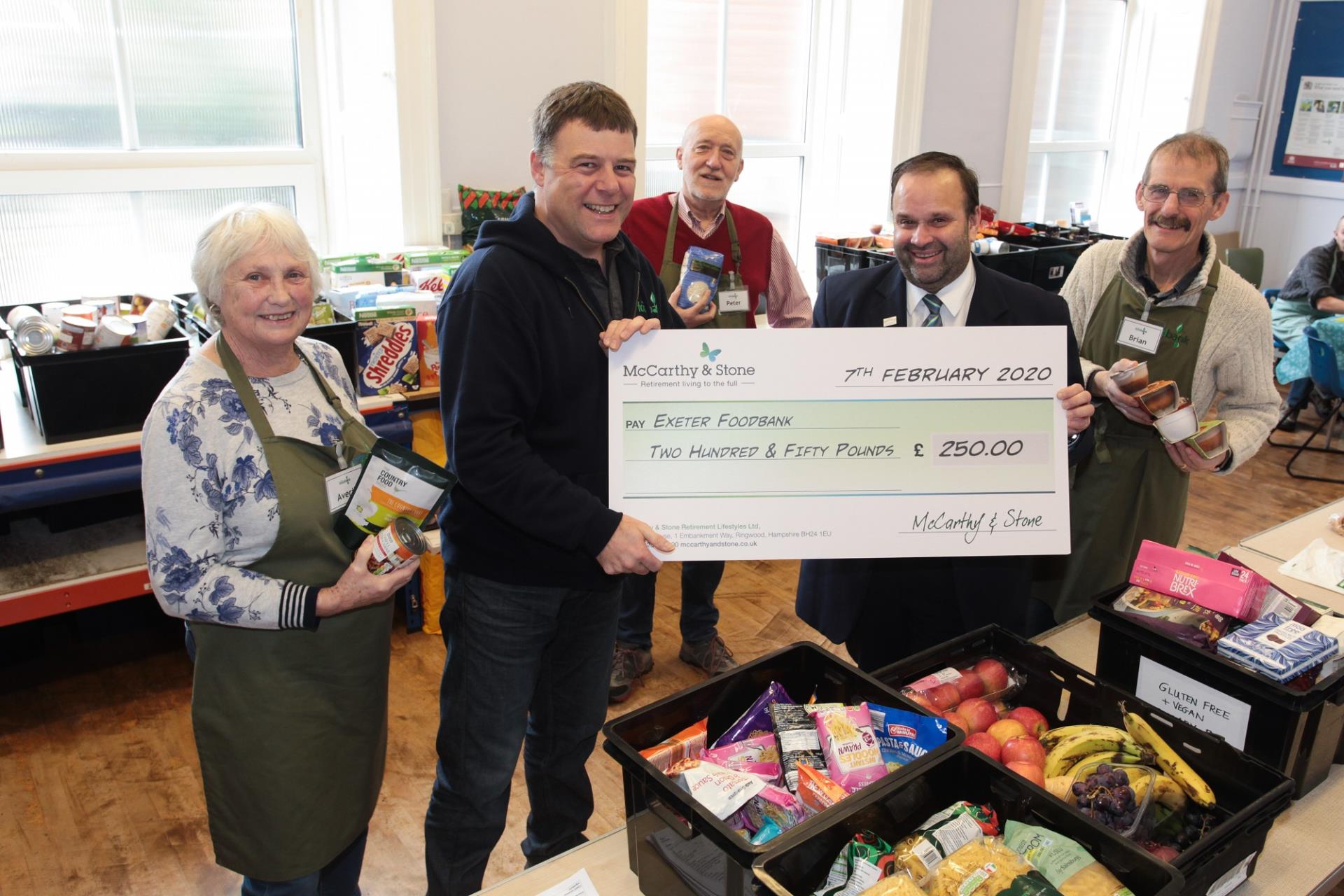 Exeter Foodbank Gets 250 Boost From  Local Retirement House Builder