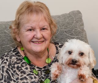 Applegate House homeowner Mary Strange and her dog Pepsi