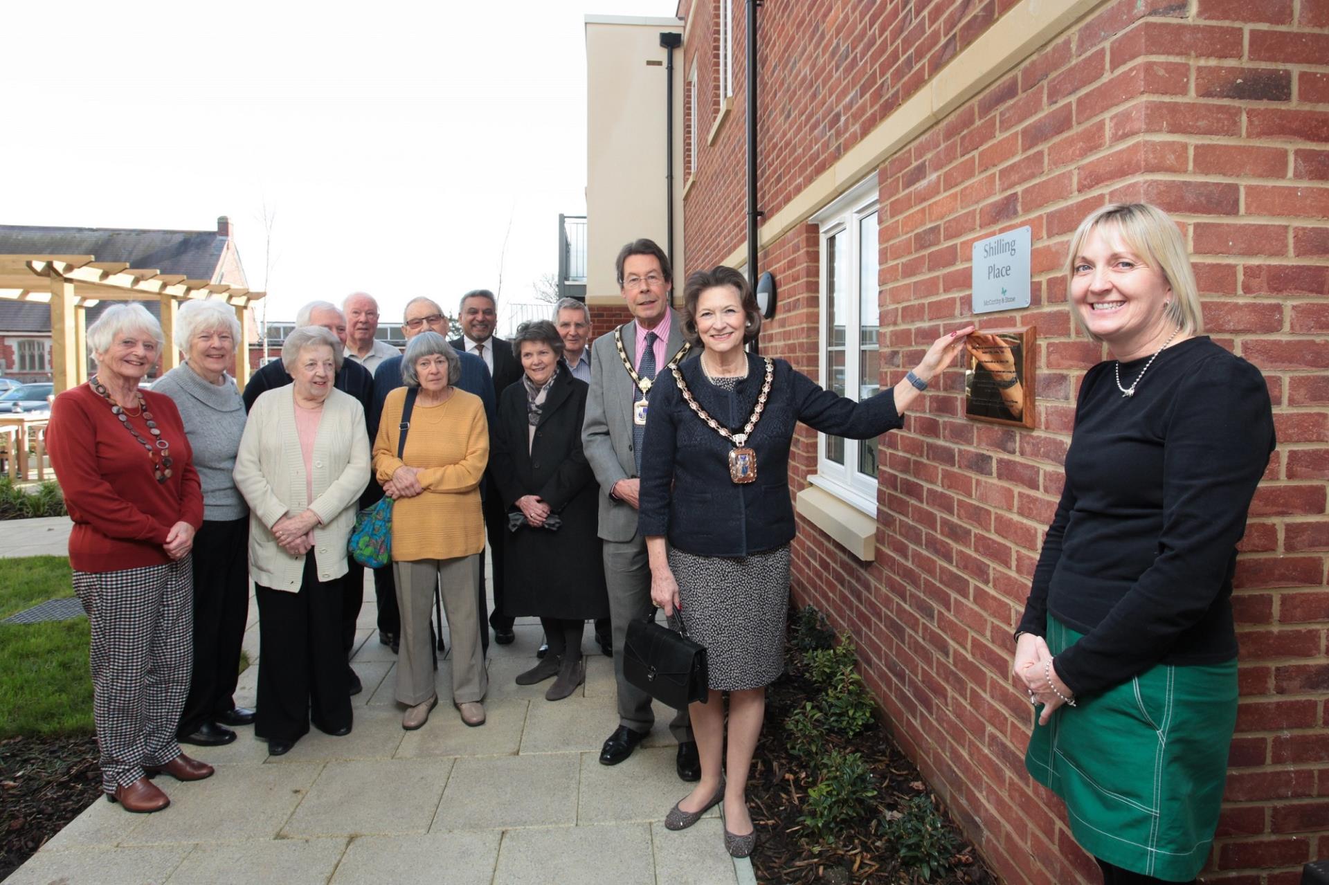 a group of people standing outside a building