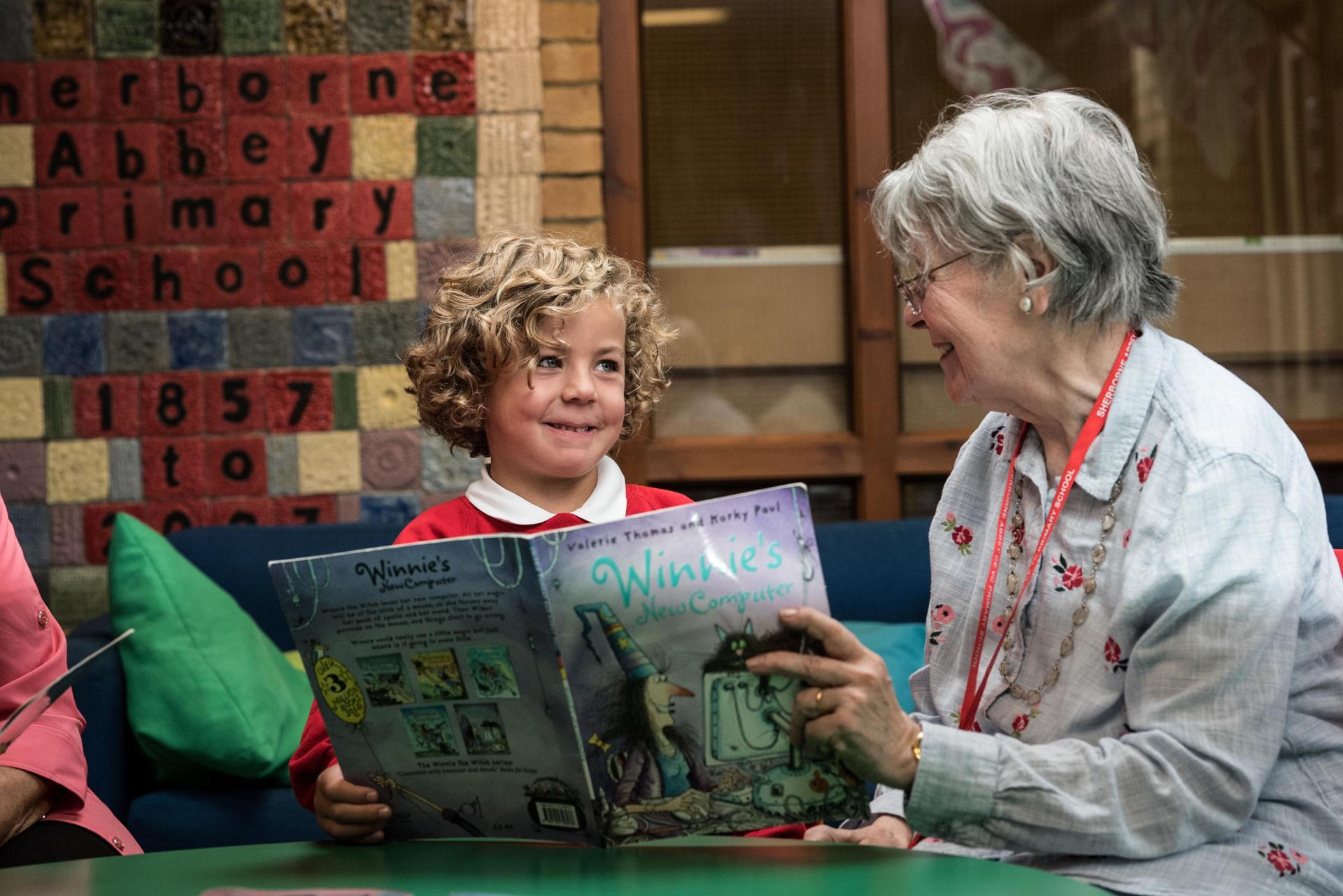 McS_Foundation_McCarthy_Stone_Homeowner_reading_with_children