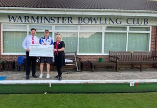 The McCarthy Stone team from our over 60s retirement housing in Warminster, Wiltshire, give £500 to Warminster Bowls Club