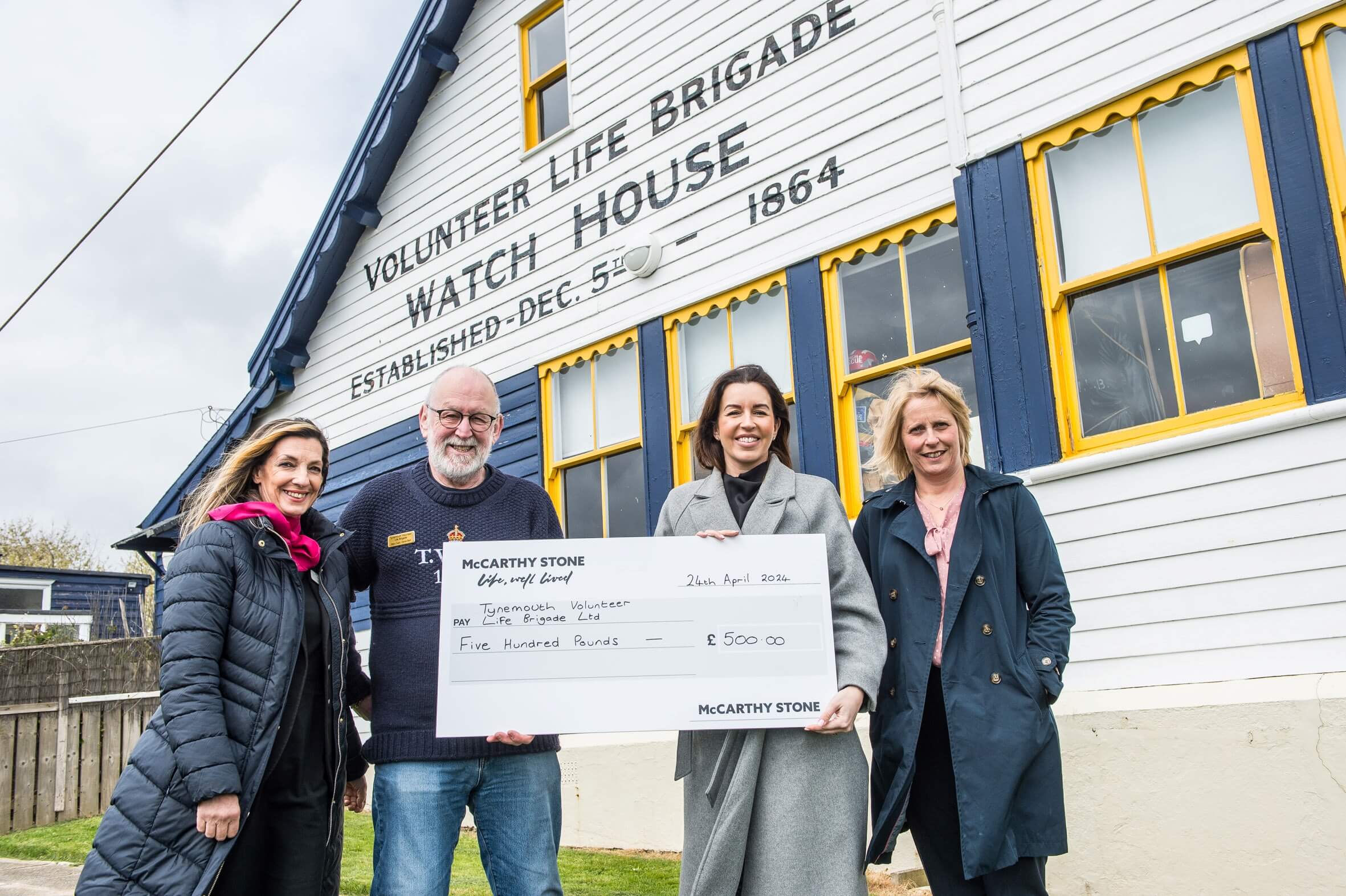 McCarthy Stone’s Whitley Bay team give cheque to Tynemouth Volunteer Life Brigade