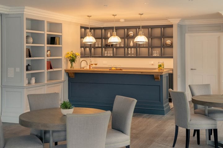 a kitchen with a blue bar