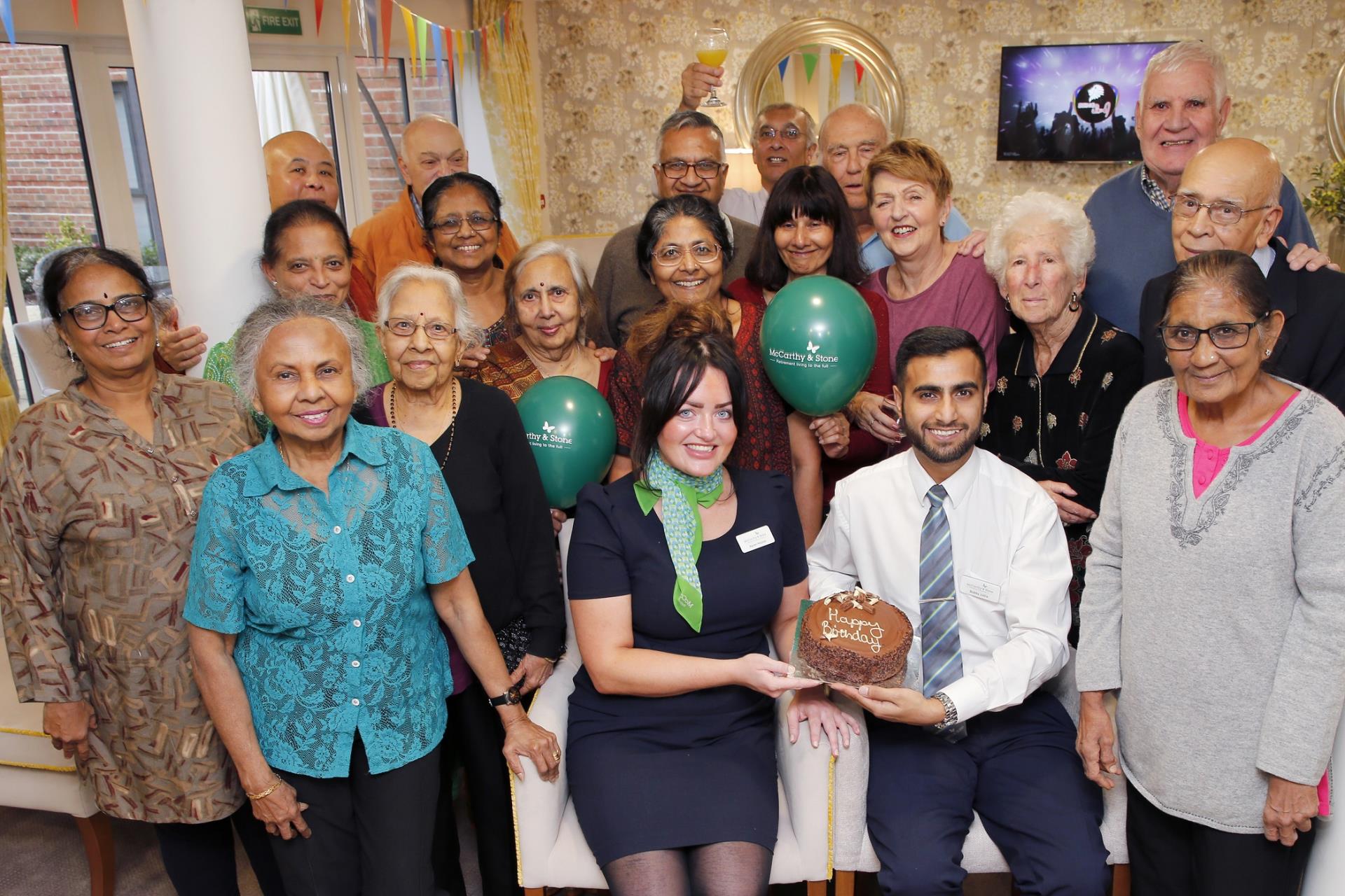 a group of people posing for a photo