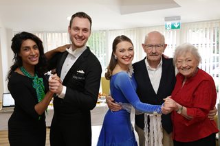 a group of people smiling