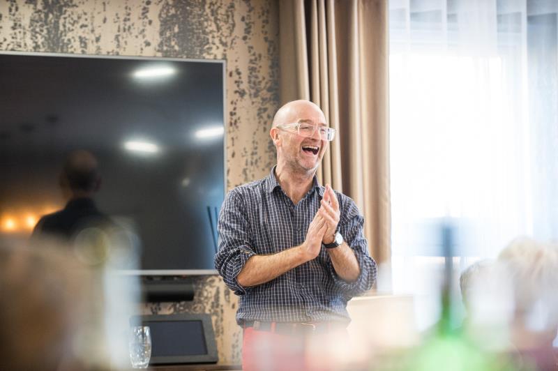a man talking on a cell phone