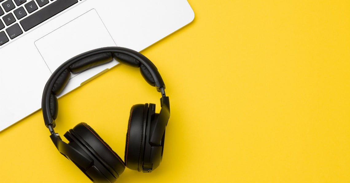 a pair of headphones on a laptop