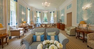 a living room with a blue couch