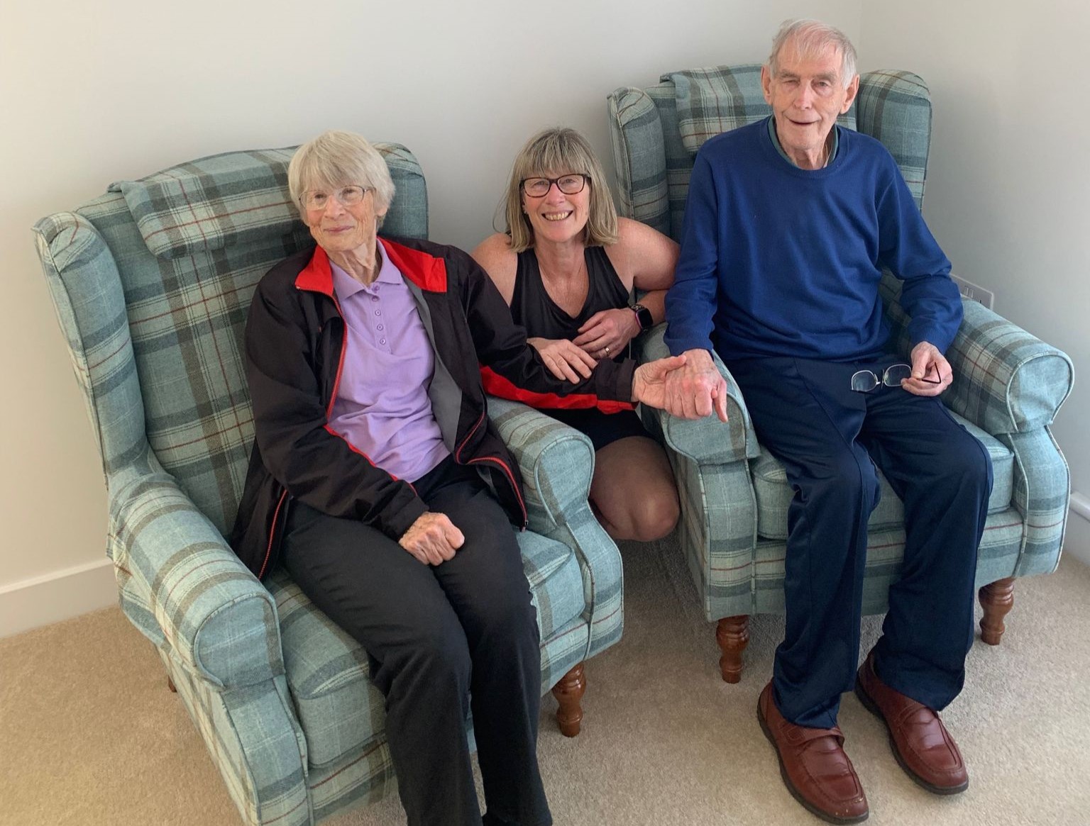 a group of people sitting on a couch