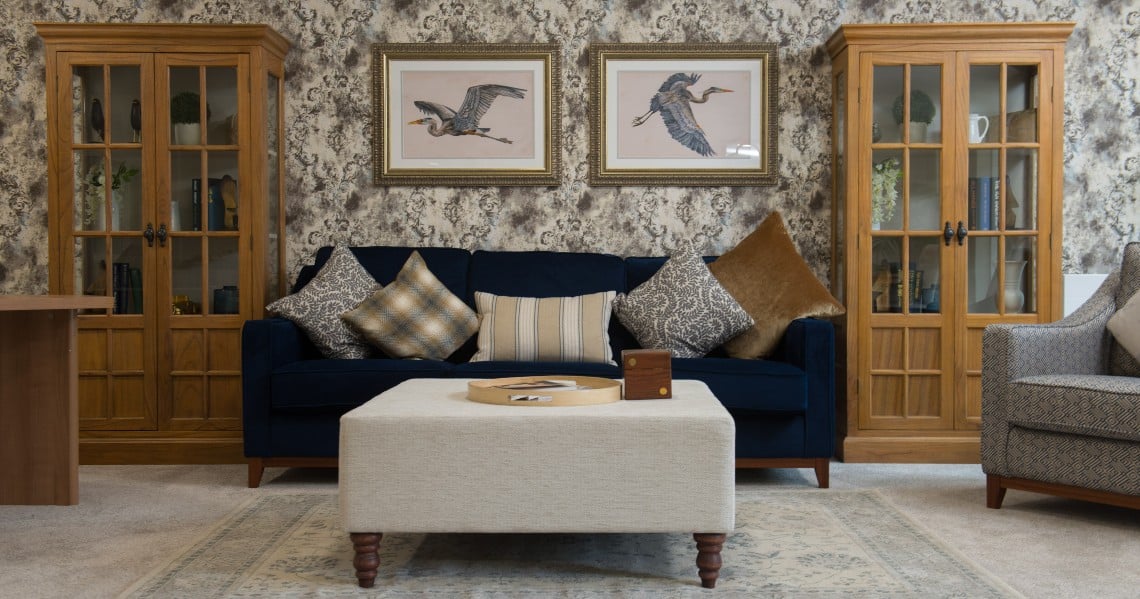 a living room with a couch and a table