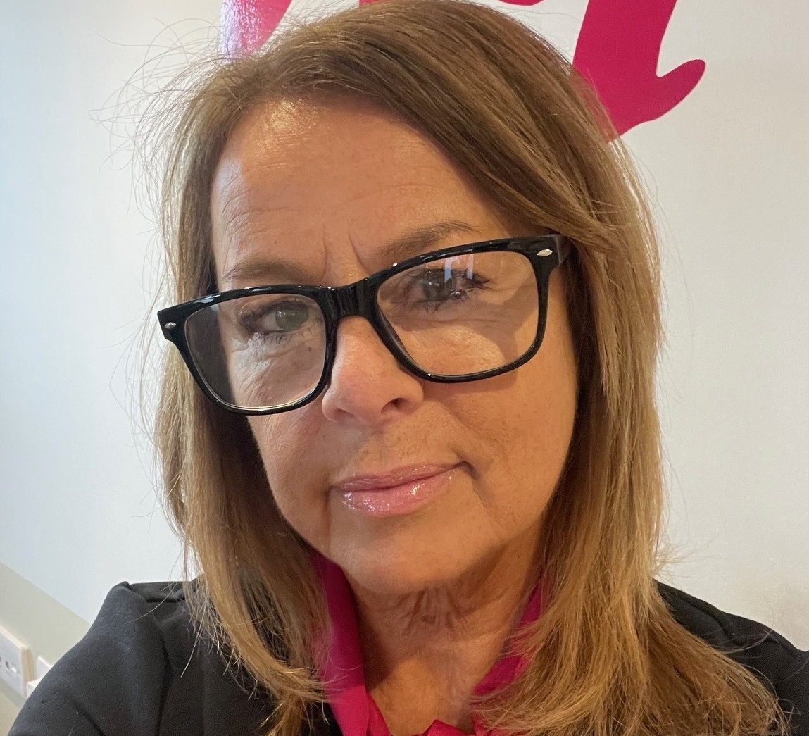 a woman wearing glasses