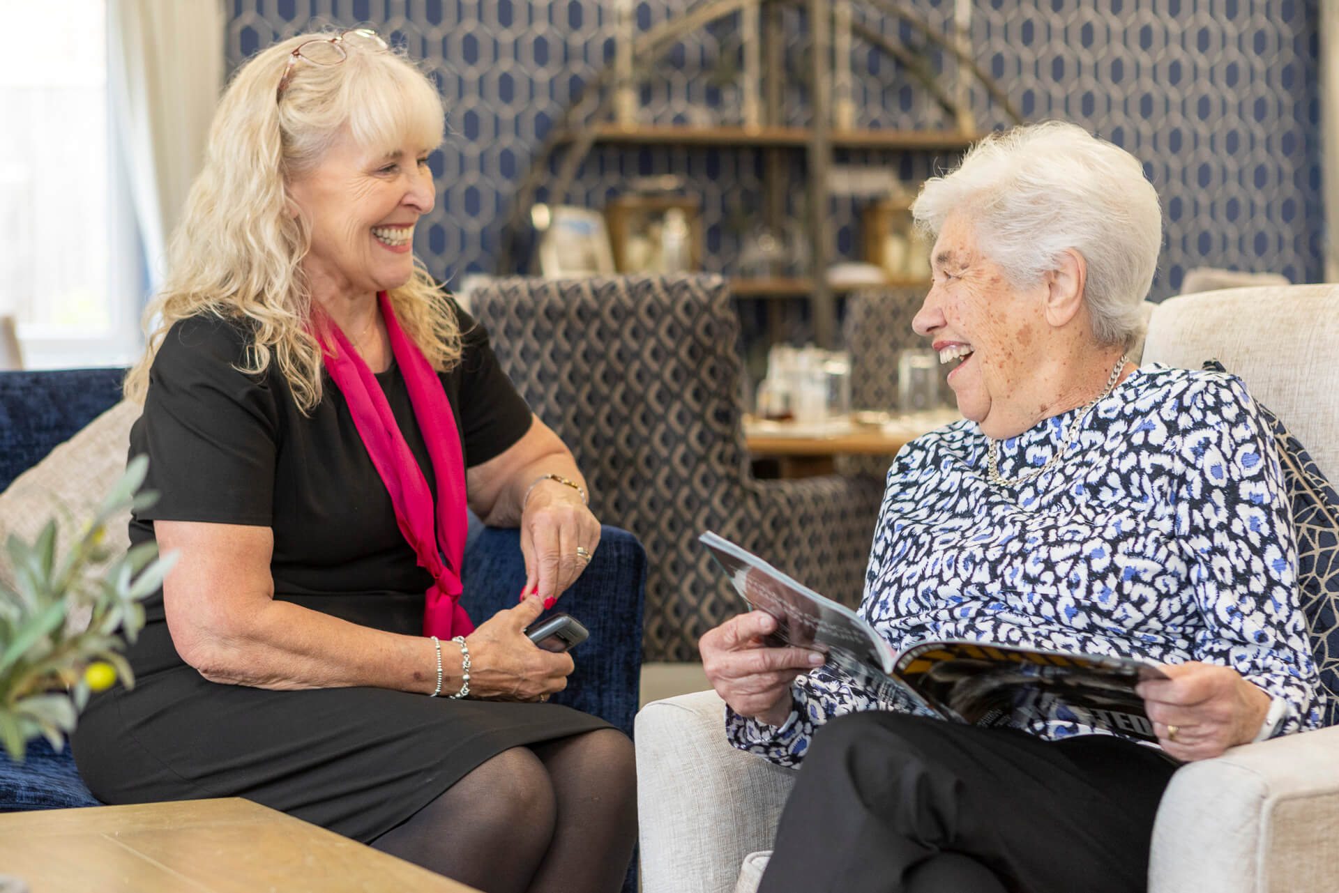 Woman enjoying retirement at a McCarthy Stone Retirement Living Plus development in Tunbridge Wells
