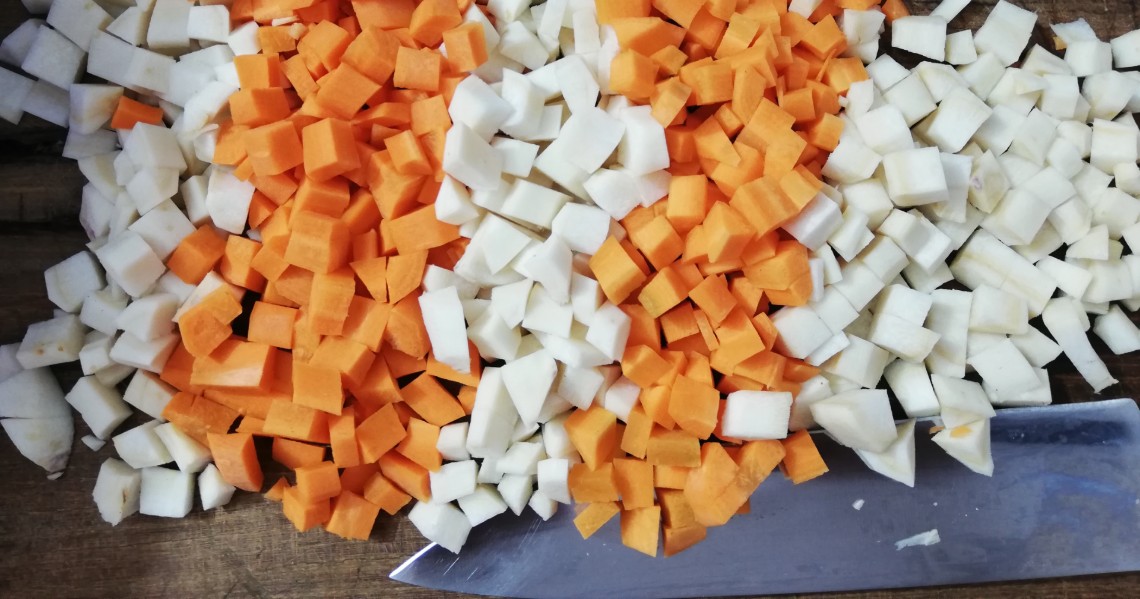 a group of cut up vegetables