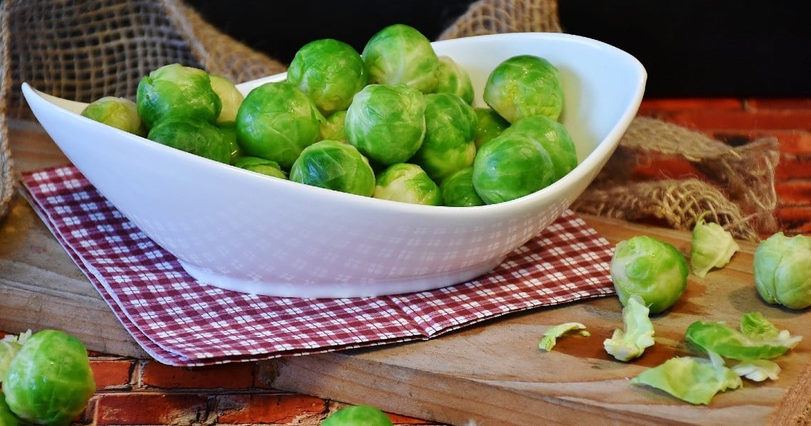 a bowl of green fruit