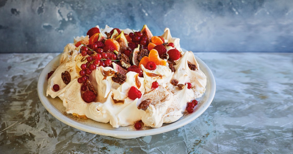 a cake with fruit toppings