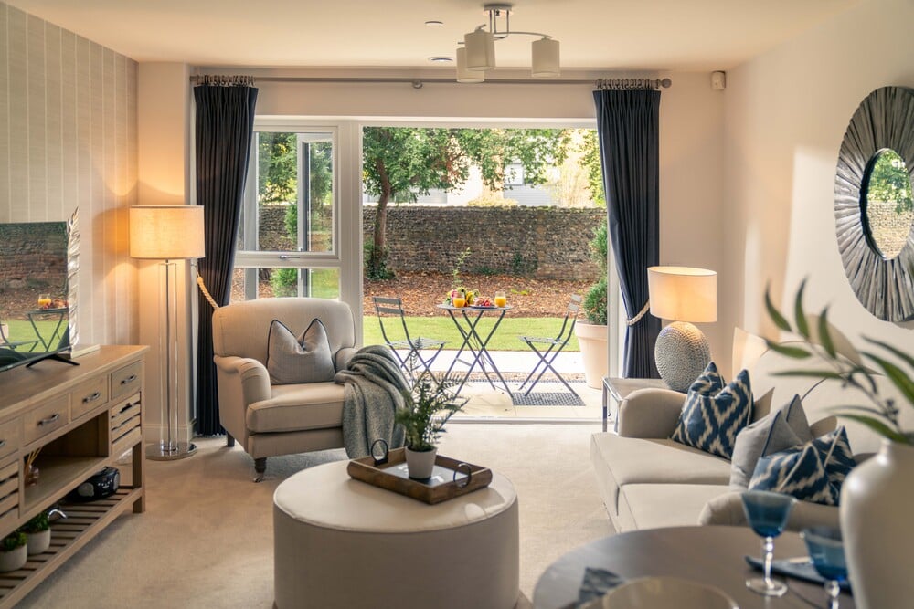 a living room with a large glass door