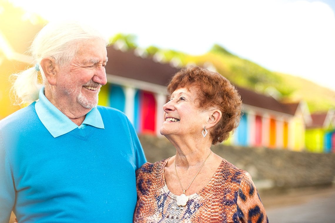 a man and a woman smiling